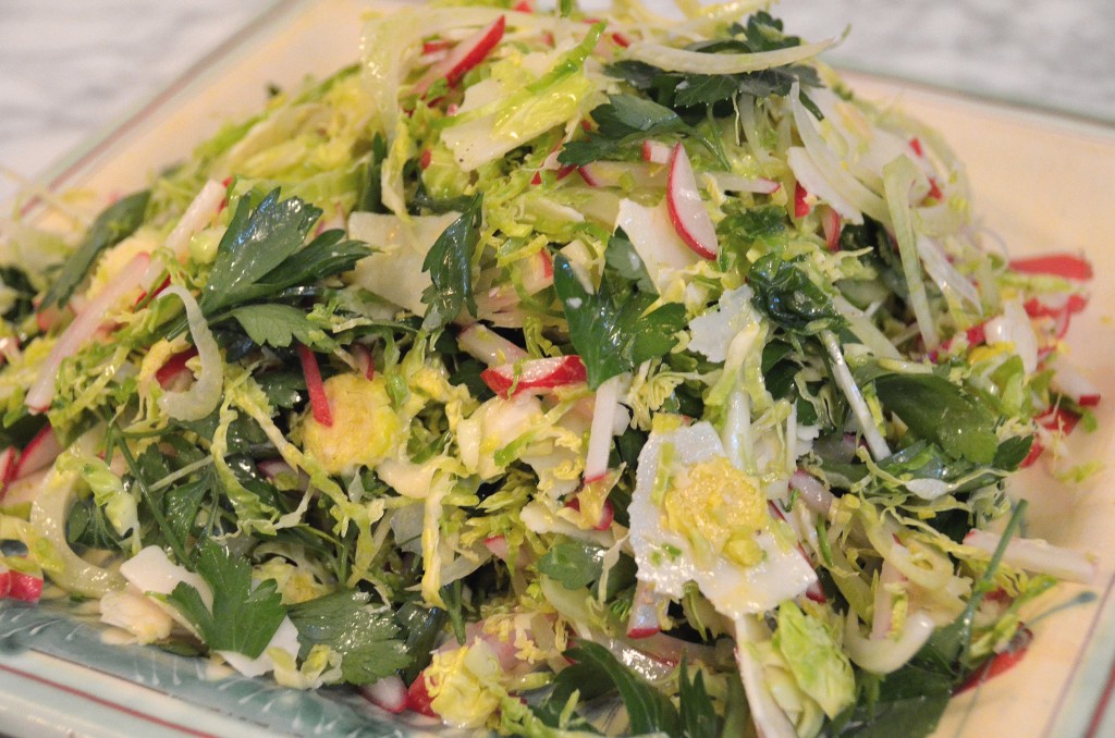 shredded brussels sprouts slaw on a square platter
