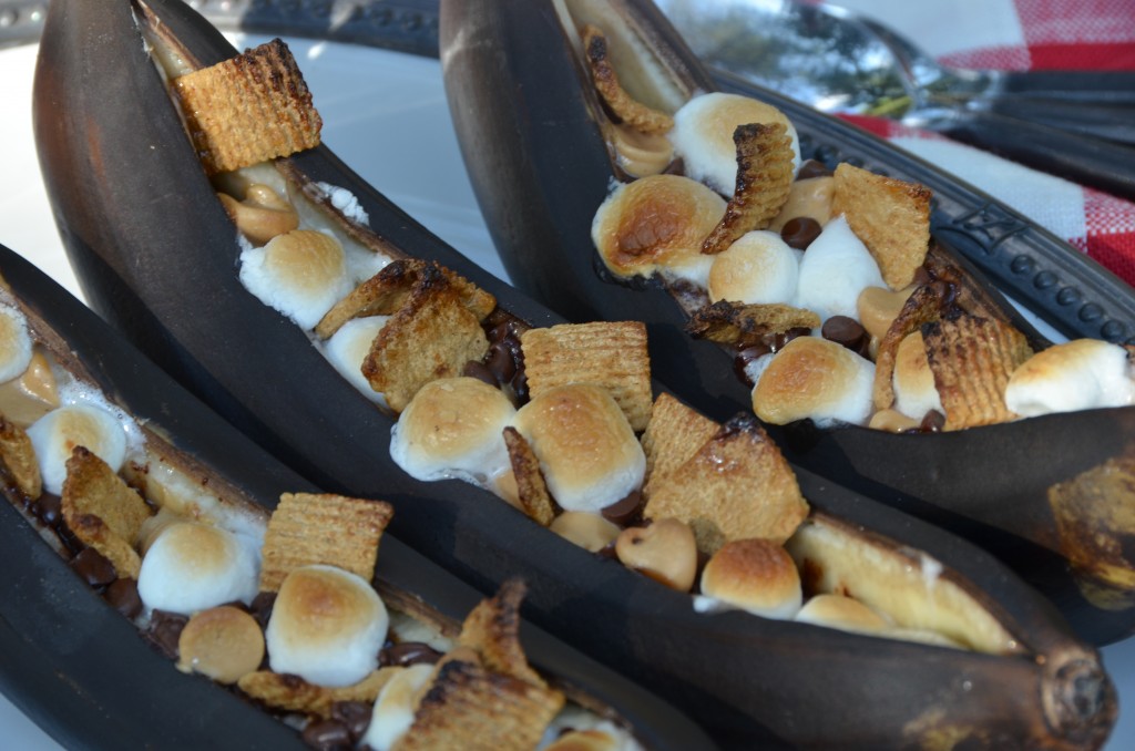Close up of the Banana s'mores with blackened peel and lightly browned marshmallows