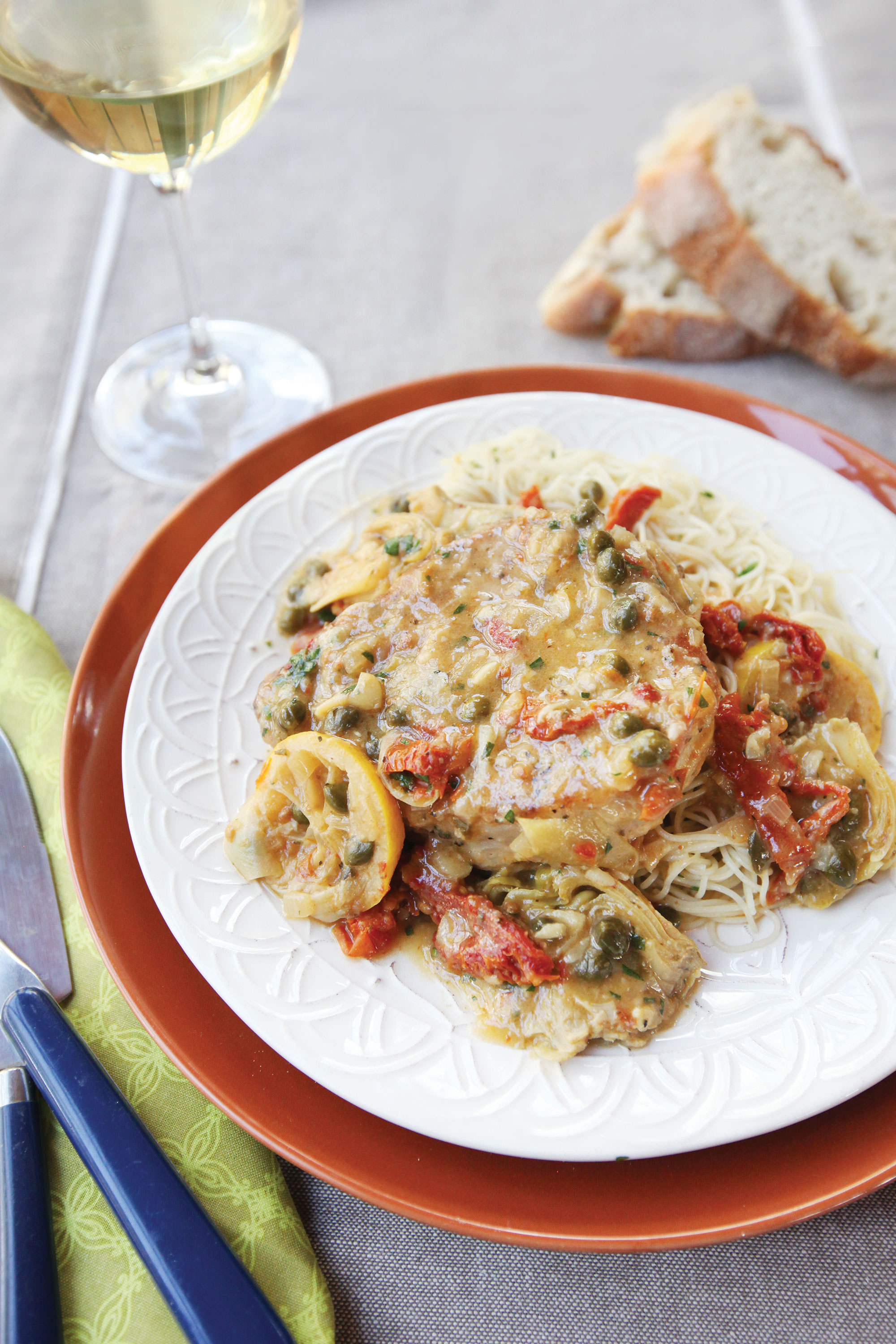 Pork Chops with Artichokes, Capers, Sun-dried Tomatoes and Lemons